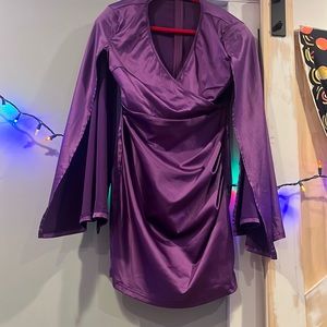 A small purple SHEIN dress with built in shoulder pads and a slit in the sleeves